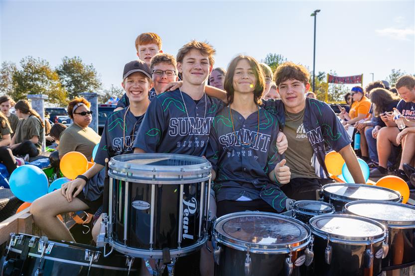 Students at the Summit High homecoming parade